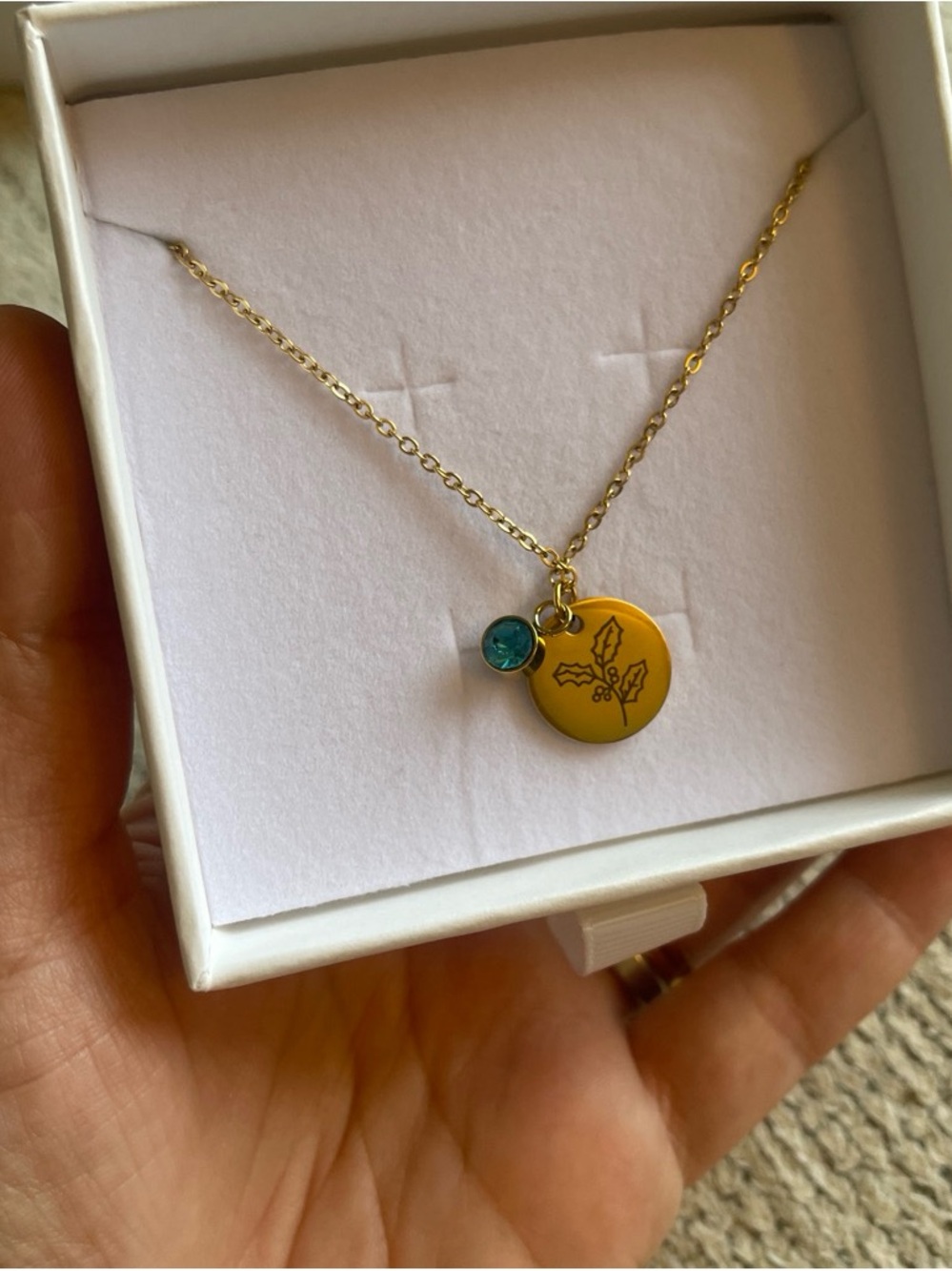 Gold Tone Disc Engraved flower Necklace with Green Crystal Accent